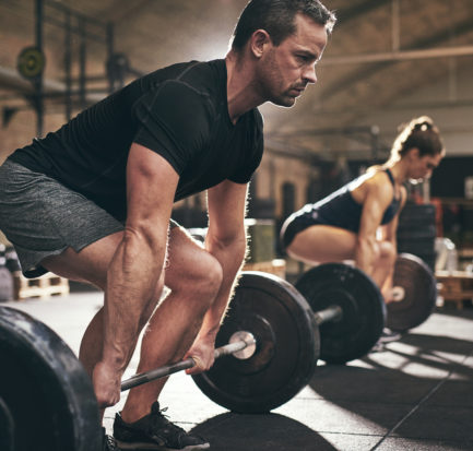 Sporty Man Woman About Lift Barbells Stock Photo