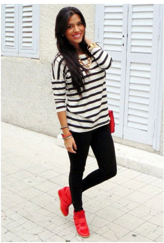 black and white outfit with red shoes