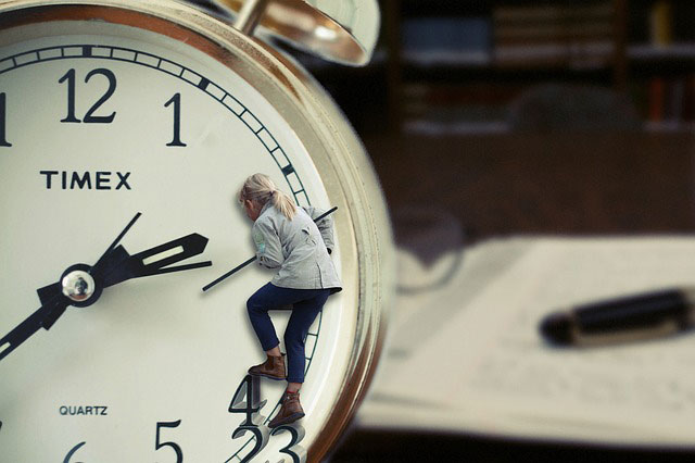 woman climbing a Timex clock