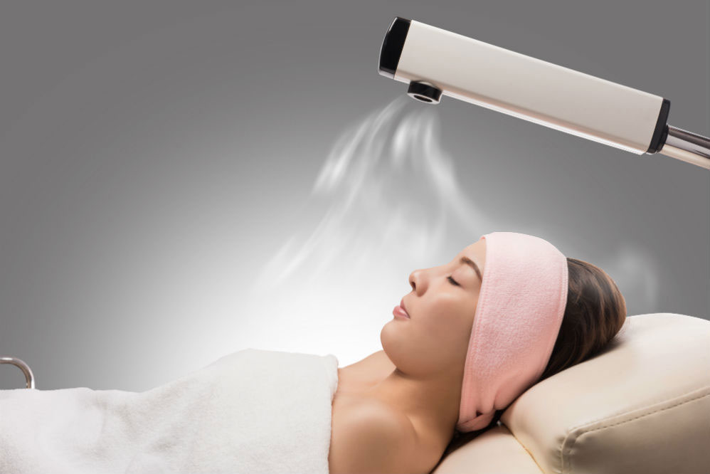 girl getting her face steamed