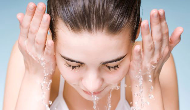 girl washing her face