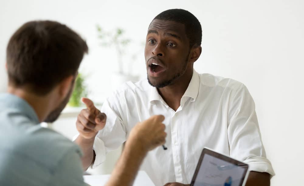 African American Businessman Disagreeing Arguing Debating Stock Photo