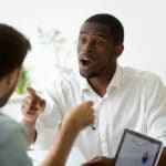 African American Businessman Disagreeing Arguing Debating Stock Photo