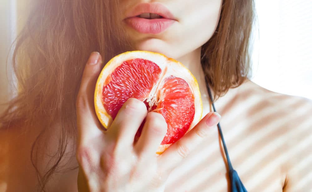Beautiful Young Sexy Woman Bikini Holding Grapefruit Stock Photo