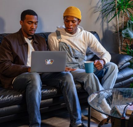men using a laptop