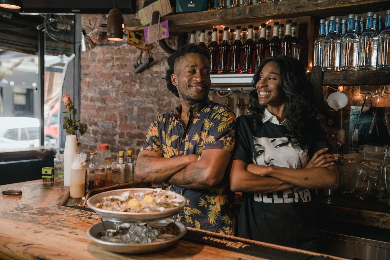 man and woman at a bar counter