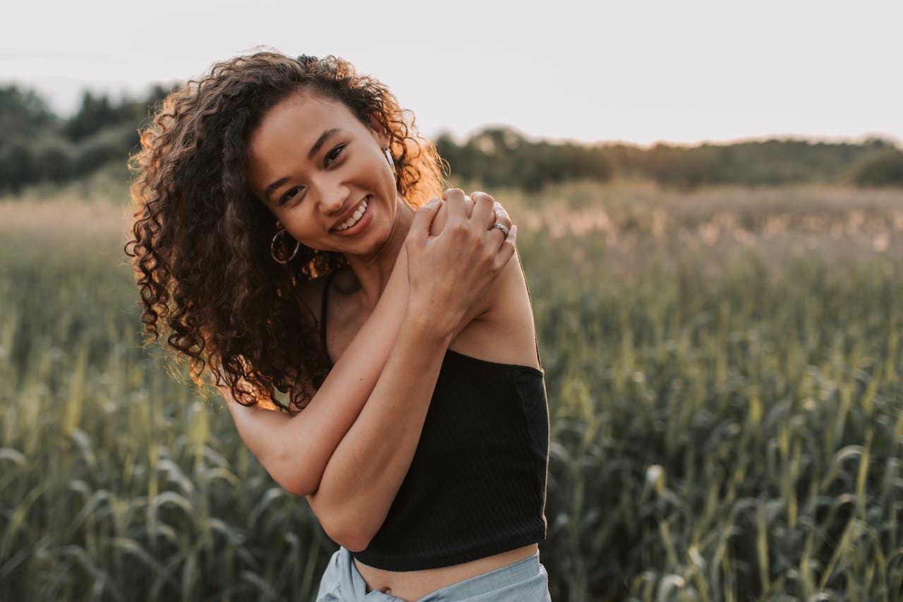 photo of woman wearing a black top