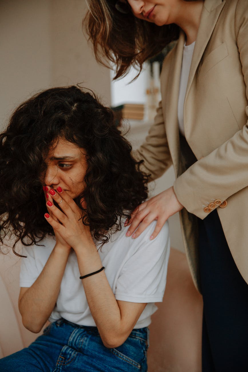 therapist comforting patient