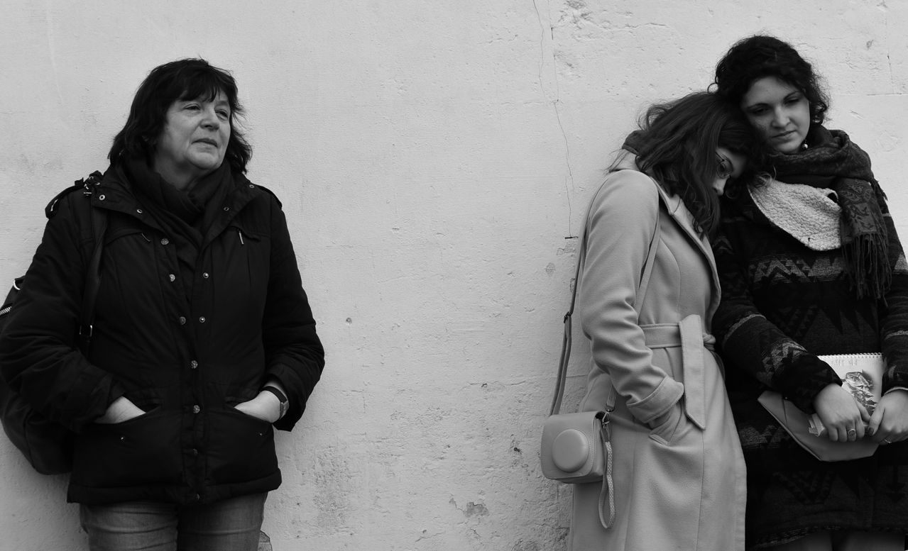grayscale photo of three women